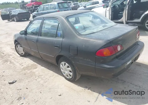 2001 Toyota Corolla Ce z USA, uszkodzony, nr VIN 2T1BR12E81C462570